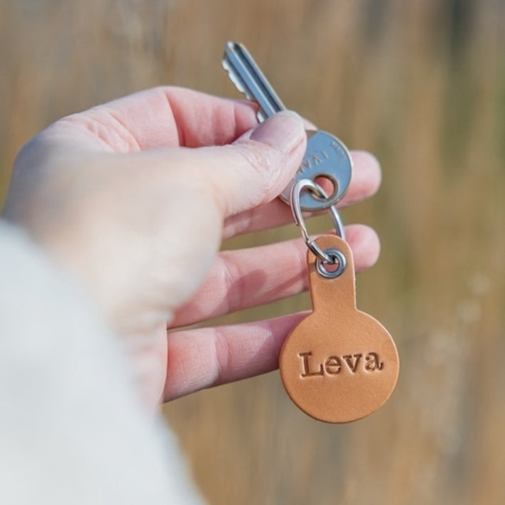 Leren kleine sleutelhanger voor een vakantiehuisje